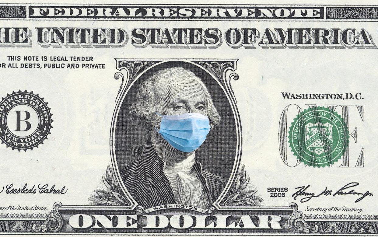 In reprioritizing public health, the U.S. limited its ability to respond quickly and effectively to the pandemic. <a href="https://www.gettyimages.com/detail/photo/quarantine-1-dollar-banknote-with-medical-mask-the-royalty-free-image/1215055651" rel="nofollow noopener" target="_blank" data-ylk="slk:Anton Petrus/Moment via Getty Images;elm:context_link;itc:0;sec:content-canvas" class="link ">Anton Petrus/Moment via Getty Images</a>