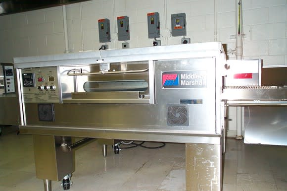 Large commercial oven labeled with Middleby brand in a kitchen.