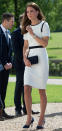 <p>For a trip to London’s National Maritime Museum, Kate donned a stylish white dress by Jaeger. The Duchess accessorised with a Stuart Weitzman clutch and blue suede heels by Alexander McQueen. </p><p><i>[Photo: PA]</i></p>