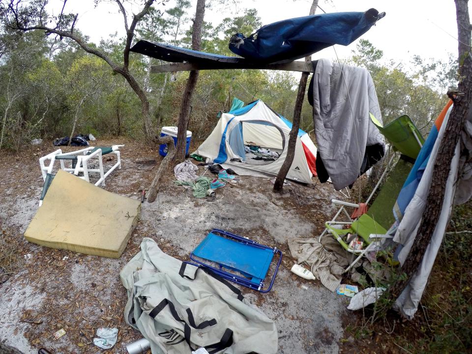 People experiencing homelessness made camps in this wooded area in Destin in 2019. Local cold night shelters in Fort Walton Beach and Crestview are in need of volunteers and supplies.