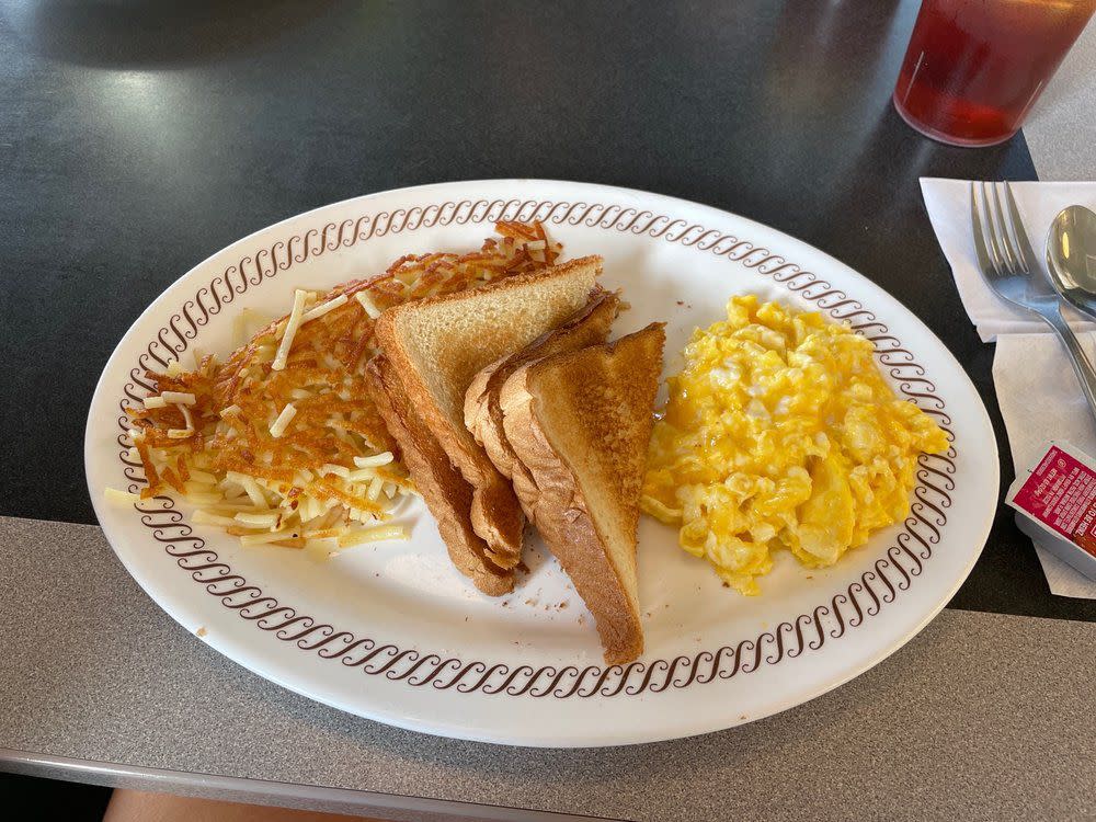 scrambled eggs, toast, and hash browns from waffle house