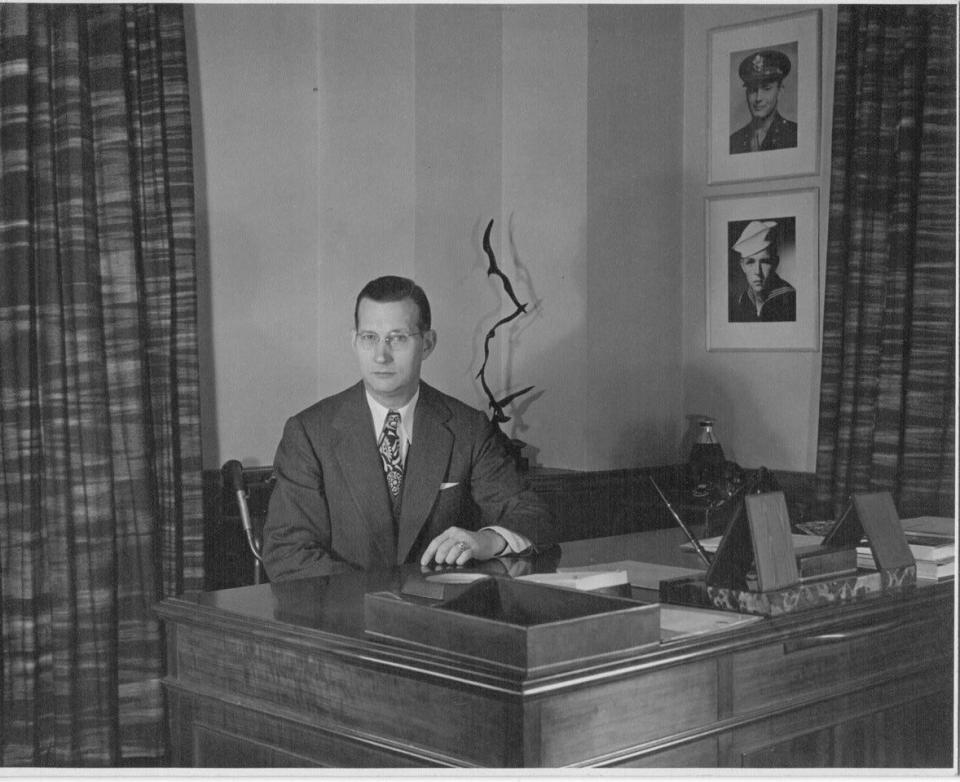 J.H.S. Ellis in his office at Arthur Kudner, Inc., New York, undated but presumably early 1940s. Morgan says the executive desk and the marble pen holder pictured here still exist in the family's vacation home in Hot Springs, Virginia.