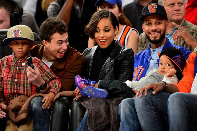 <p>James Devaney/WireImage</p> Kasseem David Dean Jr., Cole Cook, Alicia Keys, Swizz Beatz and Egypt Dean attend the Miami Heat vs New York Knicks game at Madison Square Garden on November 2, 2012 in New York City.