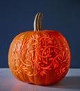 <p>Here's a pro trick for nailing this glowing 3D effect: Use a lemon zester, clay loop, or linoleum cutter to carve into — but not through — the top layer of pumpkin skin. </p>