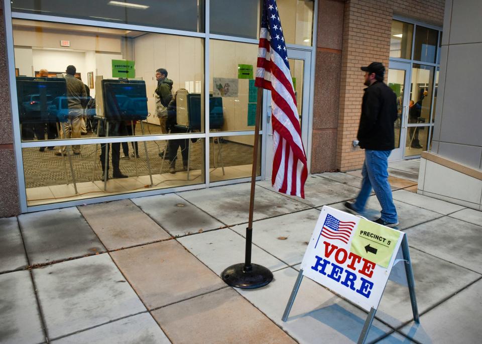 Voters arrive to cast their ballots Tuesday, Nov. 6, at the Sauk Rapids Government Center.