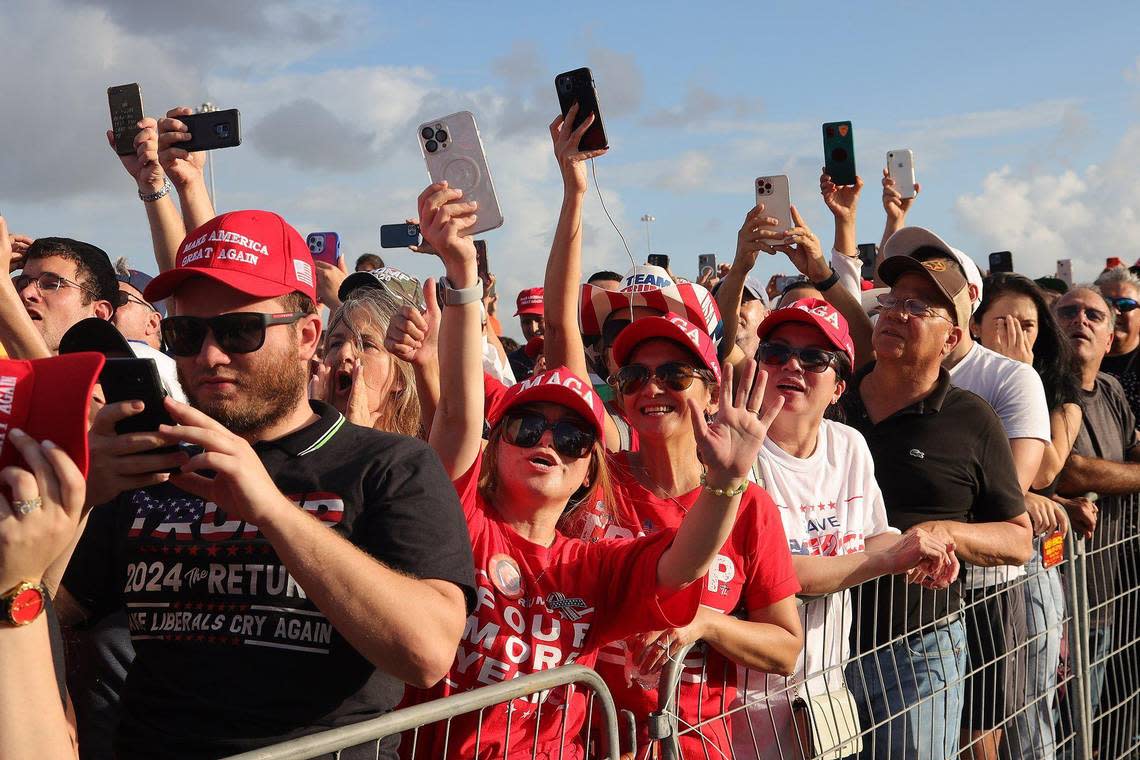 Supporters of former President Donald Trump begin to cheer his arrival after waiting for several hours to see him at the Miami-Dade County Fair and Exposition on Sunday, November 6, 2022. Trump and a collection of other national and local Republicans campaigned with U.S. Sen. Marco Rubio on the eve of the Nov. 8 election. Carl Juste/cjuste@miamiherald.com