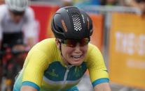 Cycling - Gold Coast 2018 Commonwealth Games - Women's Road Race - Currumbin Beachfront - Gold Coast, Australia - April 14, 2018. Chloe Hosking of Australia wins the race. REUTERS/Paul Childs