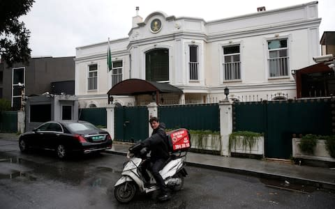 A food delivery man leaves after delivering food at Saudi Arabia's consul's residence, in Istanbul - Credit: Lefteris Pitarakis