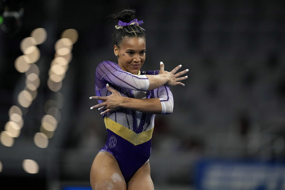 LSU's Haleigh Bryant competes on the floor exercise during the semifinals of the NCAA women's gymnastics championships, Thursday, April 13, 2023, in Fort Worth, Texas. (AP Photo/Tony Gutierrez)