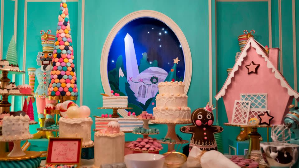 Deck the halls: The White House's China Room transformed into a dessert shop, tables laden with festive treats. - Evan Vucci/AP