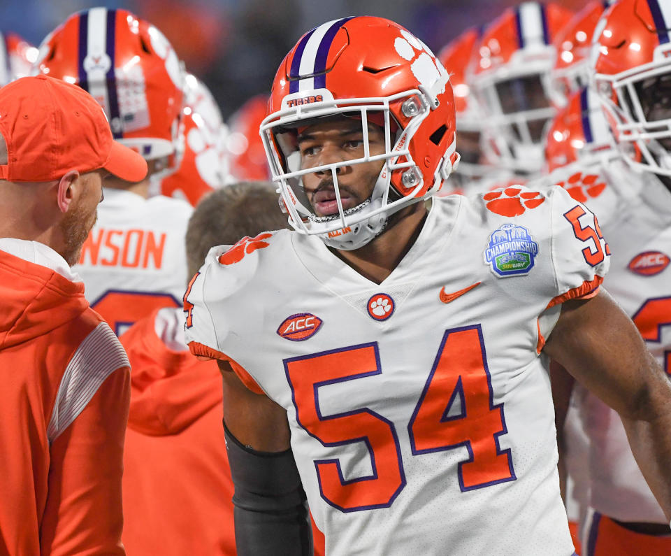 Dec 3, 2022; Charlotte, NC, USA; Clemson Tigers linebacker Jeremiah Trotter Jr. (54) warms up before the ACC Championship game against the North Carolina Tar Heels at Bank of America Stadium. Mandatory Credit: Ken Ruinard-USA TODAY NETWORK