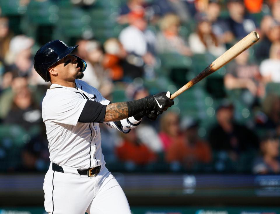 Javier Baez of the Detroit Tigers hits a sacrifice fly ball to drive in a run against the Minnesota Twins during the second inning of game two of a doubleheader at Comerica Park on April 13, 2024 in Detroit, Michigan.