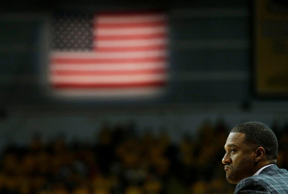 Wisconsin-Milwaukee head coach Rob Jeter watches during the first half of an NCAA college basketball game against Wisconsin, Wednesday, Dec. 10, 2014, in Milwaukee. (AP Photo/Morry Gash)