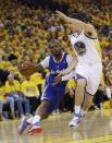 Los Angeles Clippers' Chris Paul drives to the basket as Golden State Warriors' Klay Thompson (11) defends during the first half in Game 3 of an opening-round NBA basketball playoff series, Thursday, April 24, 2014, in Oakland, Calif. (AP Photo/Marcio Jose Sanchez)