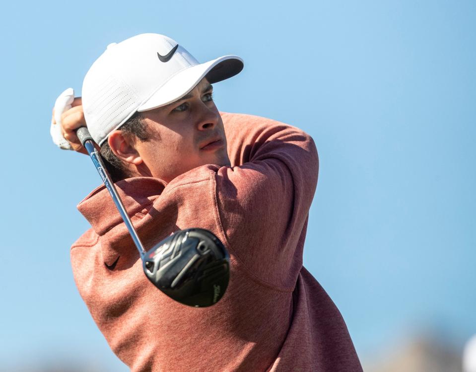 Davis Thompson tees off on hole one to start the final round of The American Express on the Pete Dye Stadium Course at PGA West in La Quinta, Calif., Sunday, Jan. 22, 2023. 