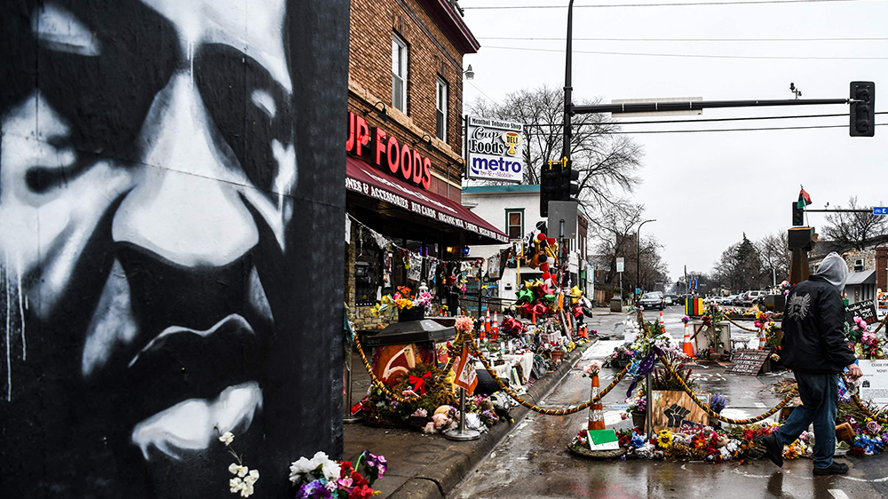 <p>Flowers laid at scene of George Floyd’s death.</p> (AFP)