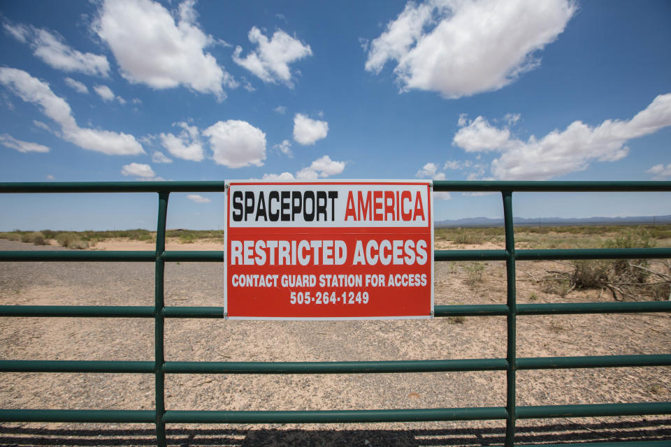 A sign is posted on a fence at Spaceport America on Thursday, July 8, 2021.
