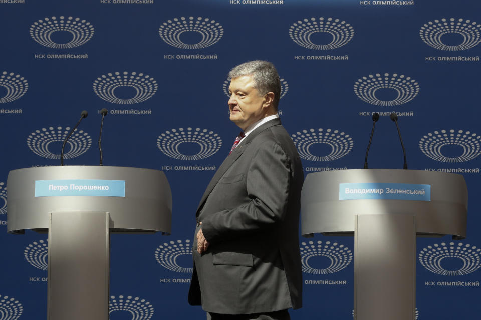 Ukrainian President Petro Poroshenko arrives to deliver his speech ahead of the presidential elections on April 21, at the Olympic stadium in Kiev, Ukraine, Sunday, April 14, 2019. With one week remaining until Ukraine's presidential election, incumbent Petro Poroshenko has come to the country's largest stadium for a proposed debate where his opponent didn't show up. (AP Photo/Efrem Lukatsky)