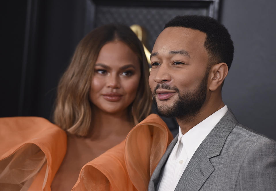 Teigen and Legend arrive at the 62nd annual Grammy Awards at the Staples Center on Jan. 26 in Los Angeles.  (Photo: Jordan Strauss/Invision/AP)