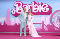 Ryan Gosling, left, and Margot Robbie pose for photographers upon arrival at the premiere of the film 'Barbie' on Wednesday, July 12, 2023, in London. (Vianney Le Caer/Invision/AP)