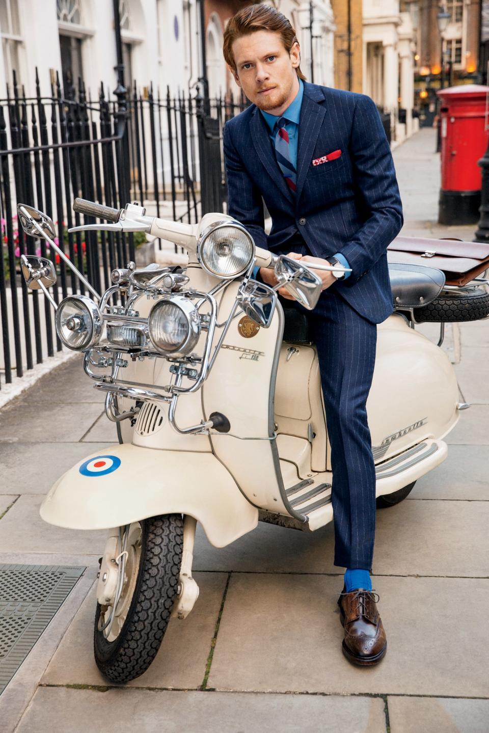 Brown shoes + bright blue socks = a style win, every time.