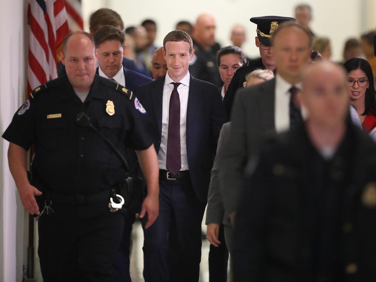 mark zuckerberg congress WASHINGTON, DC - OCTOBER 23: Facebook co-founder and CEO Mark Zuckerberg leaves the Rayburn House Office Building after testifying before the House Financial Services Committee for six hours on Capitol Hill October 23, 2019 in Washington, DC. Zuckerberg testified about Facebook's proposed cryptocurrency Libra, how his company will handle false and misleading information by political leaders during the 2020 campaign and how it handles its users’ data and privacy. (Photo by Chip Somodevilla/Getty Images)