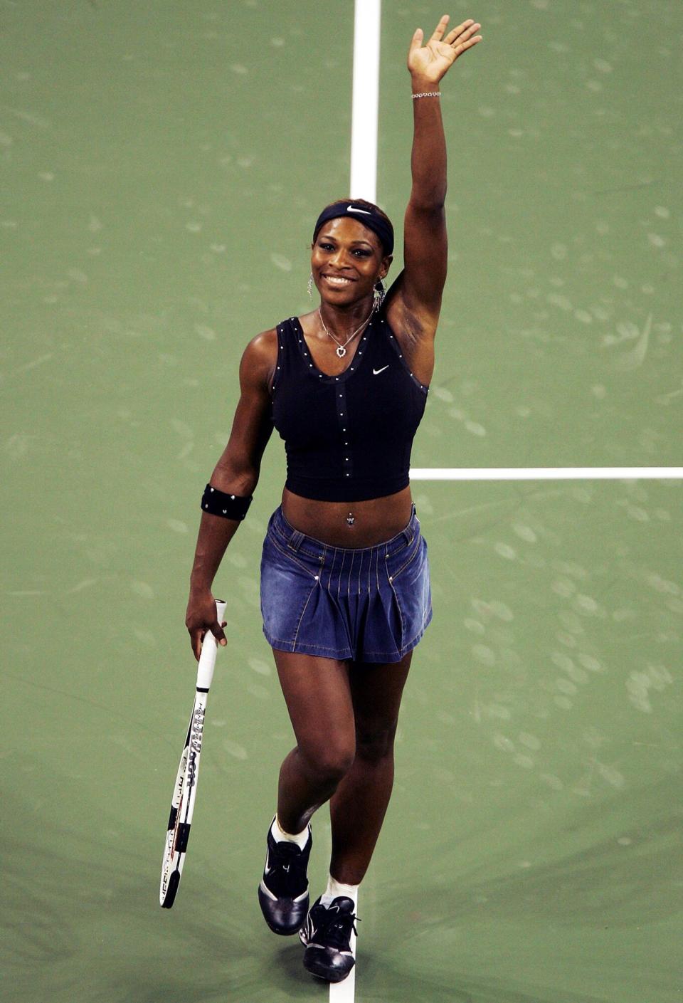 Serena Williams waves to the crowd after winning her match against Sandra Kleinova from the Chezch Republic during the US Open at the USTA National Tennis Center in Flushing Meadows Corona Park on August 30, 2004 in the Flushing neighborhood of the Queens borough of New York