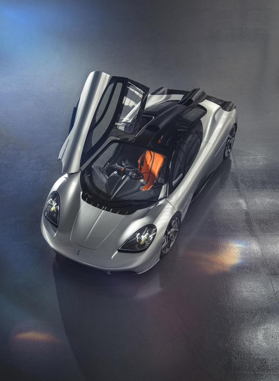 <p>The T.50 is essentially a modern interpretation of the McLaren F1. It uses the same mid-engine layout, the same swing-up butterfly doors, and the same drivetrain configuration. It's just modernized to be an even more pure driving experience. </p>