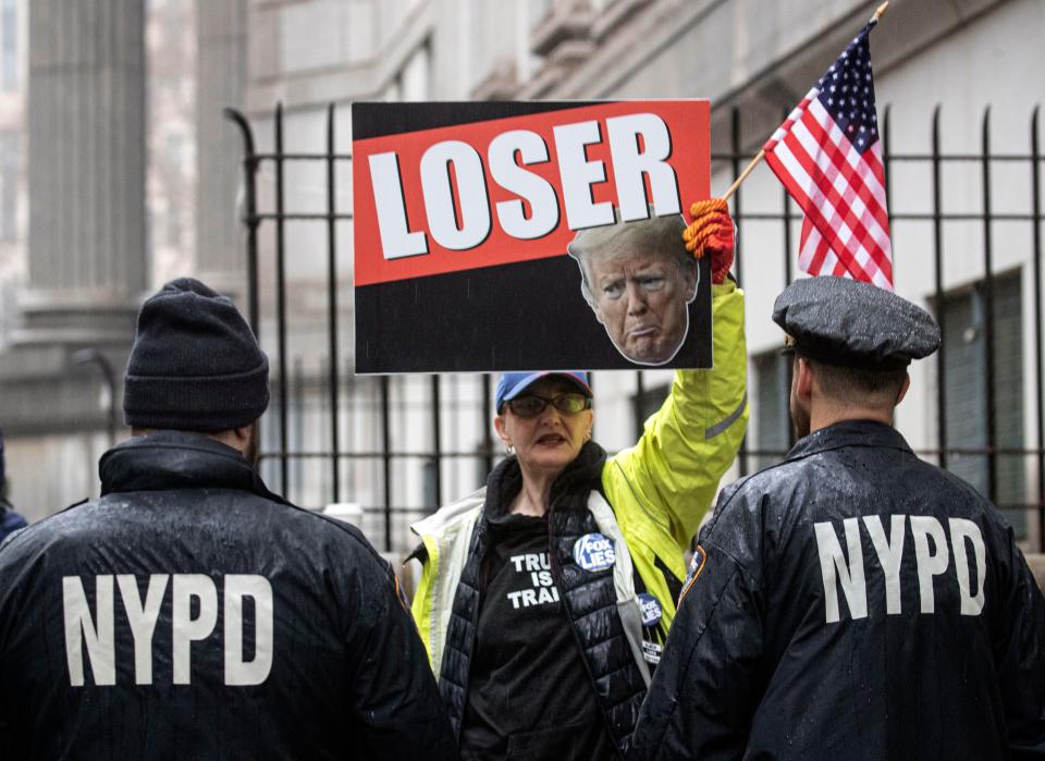 A protester outside a federal courthouse in New York City on Jan. 25, 2024.