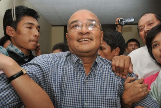 Prominent Myanmar comedian and vocal government critic, Zarganar (C), is welcomed by supporters upon his arrival at Yangon airport following his release from detention on October 12. Myanmar faced calls on Thursday to free its remaining political prisoners as the opposition expressed disappointment with a much-anticipated amnesty that left most key dissidents behind bars