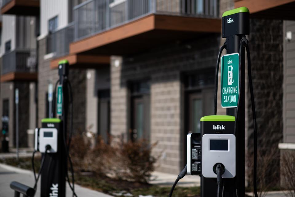 An electric vehicle charging station in the 300 block of West Lenawee Street in downtown Lansing.