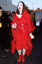 Is it a red villian? Is it a vampire? No, it's Madonna at the 1999 Grammy Awards.