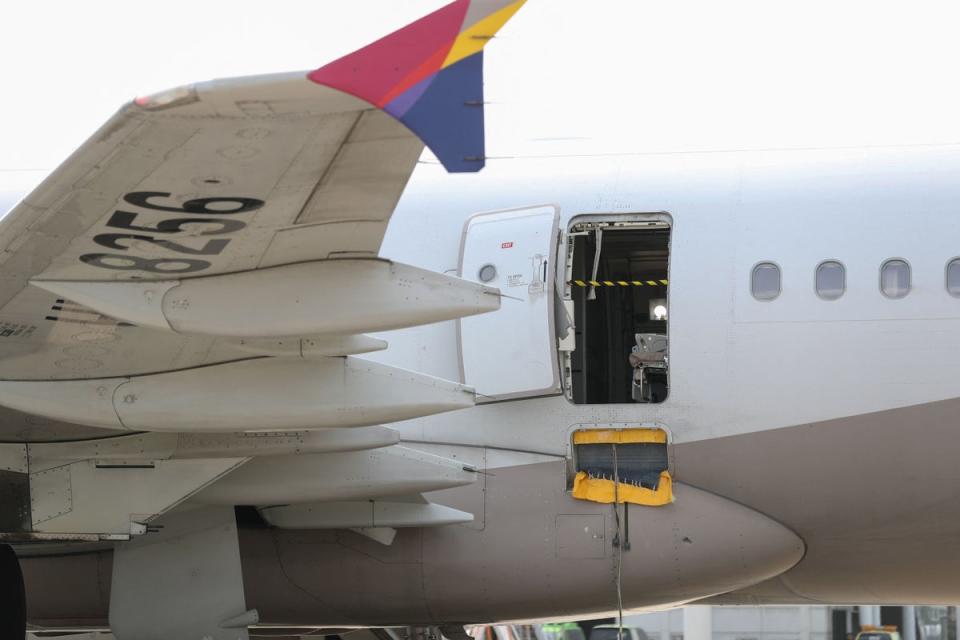 The opened door of the Asiana Airlines plane is seen at Daegu International Airport (YONHAP/AFP via Getty Images)