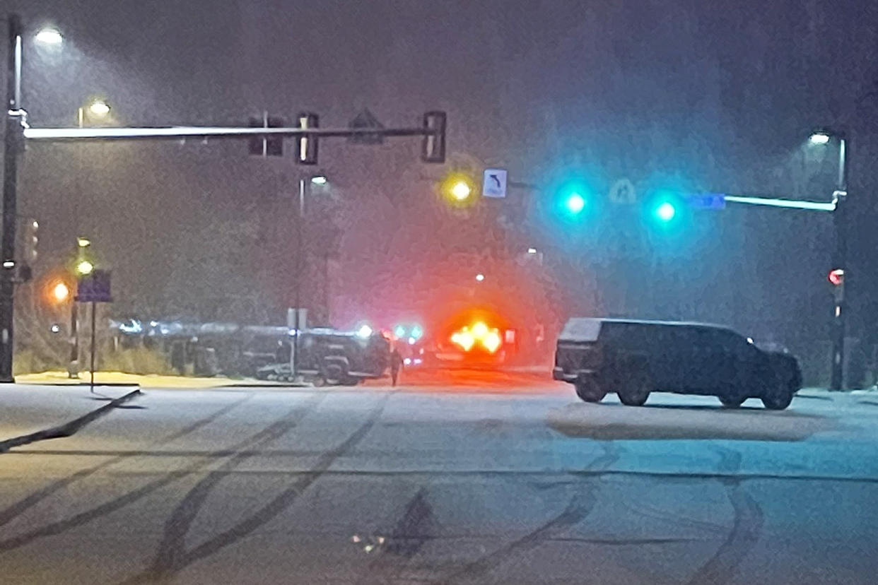 Police vehicles near the scene where authorities say an armed man barricaded himself inside a home in Boulder, Colo., on Tuesday. (Boulder Police Department)