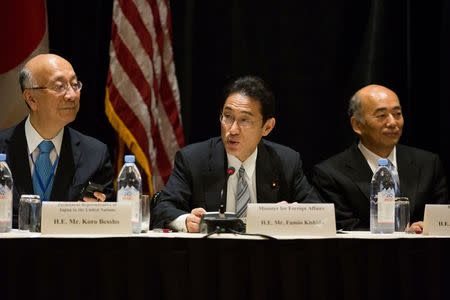 Minister of Foreign Affairs Fumio Kishida (centre) of Japan speaks during a meeting between leaders from Japan, South Korea and Japan in New York, U.S. September 18, 2016. REUTERS/Kevin Hagen/POOL