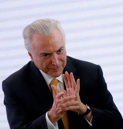 Brazil's President Michel Temer gestures as he attends a Brazilian Democratic Movement party (MDB) meeting in Brasilia, Brazil May 22, 2018. REUTERS/Adriano Machado