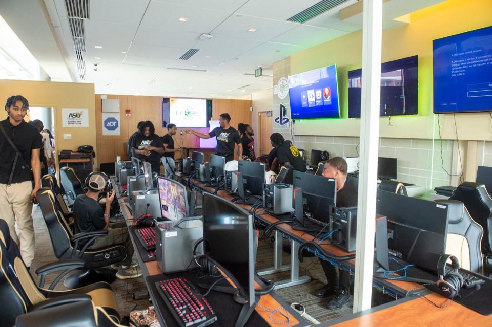 Students gather to play games at the opening of the ASU Gaming and Esports Lab at the John Garrick Hardy Center at Alabama State University in Montgomery, Ala., on Wednesday, March 8, 2023.