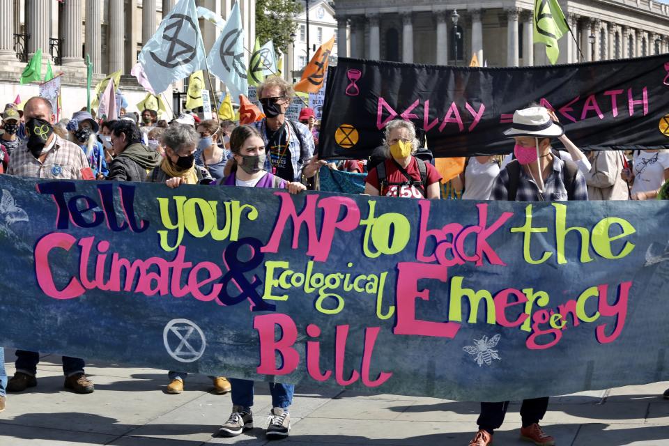 LONDON, UNITED KINGDOM - SEPTEMBER 1: Protesters holding placards take part in a demonstration organised by the environmental group Extinction Rebellion at Trafalgar Square in London, United Kingdom on September 1, 2020. (Photo by Hasan Esen/Anadolu Agency via Getty Images)