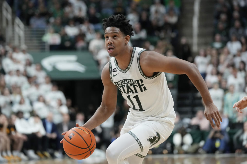 Michigan State guard A.J. Hoggard controls the ball during the second half of an NCAA college basketball game against Iowa, Thursday, Jan. 26, 2023, in East Lansing, Mich. (AP Photo/Carlos Osorio)