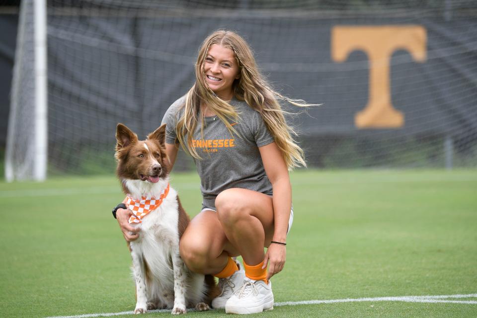 Tennessee Lady Vols soccer fifth year forward Mackenzie George and her dog Rocky pose for a portrait together during soccer media day at Regal Stadium in Knoxville, Tenn. on Thursday, Aug. 11, 2022.