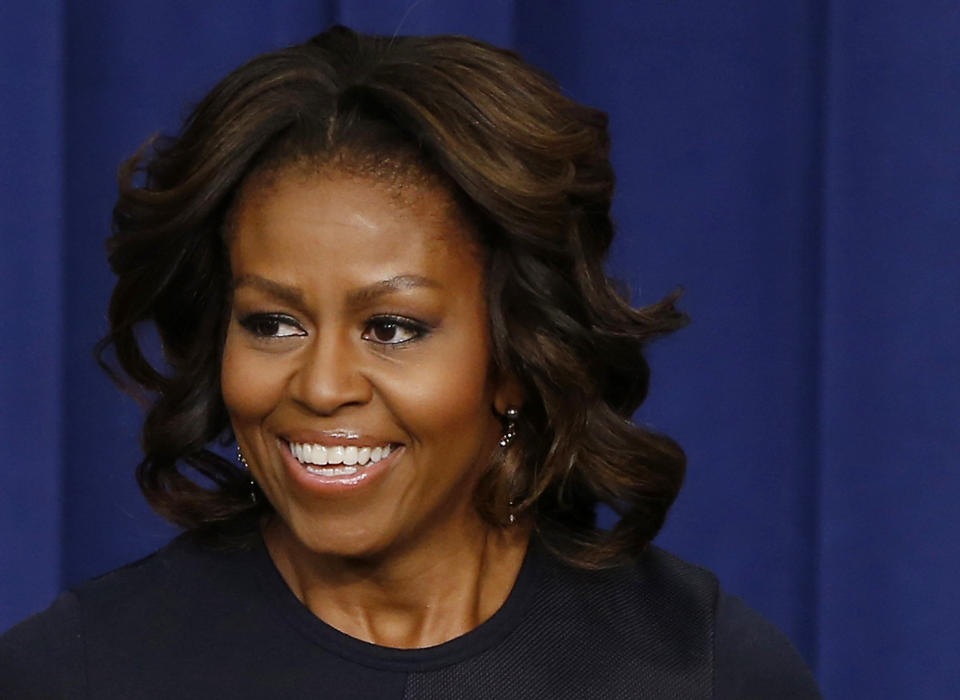 FILE - This Jan. 16, 2014, file photo, shows first lady Michelle Obama in the Eisenhower Executive Office Building on the White House complex in Washington. Michelle Obama says a pledge by the construction industry to hire 100,000 veterans by 2019 isn’t only the right thing to do, it’s a smart thing for business. Some 100 companies and associations in the construction field are announcing their veterans’ hiring commitments on Monday, Feb. 10, 2014, at a conference organized by the Labor Department and the initiative Joining Forces. Joining Forces is a nationwide effort launched in 2011 by Mrs. Obama and the vice president’s wife to rally the nation around military veterans. (AP Photo/Charles Dharapak, File)