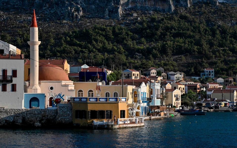 The tiny Greek island of Kastellorizo lies close to the Turkish coast  - AFP