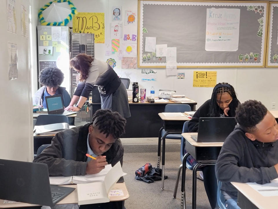 Adelman-Cannon teaching a sixth-grade English language arts class. (Karla Marie Cochran)