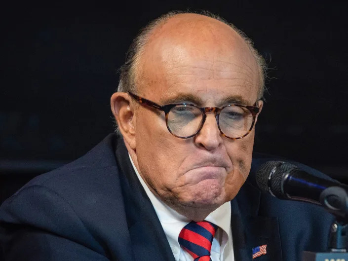 Rudy Giuliani frowns