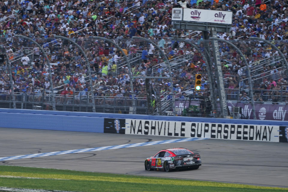 Martin Truex Jr. speeds around the track during a NASCAR Cup Series auto race, Sunday, June 25, 2023, in Lebanon, Tenn. (AP Photo/George Walker IV)