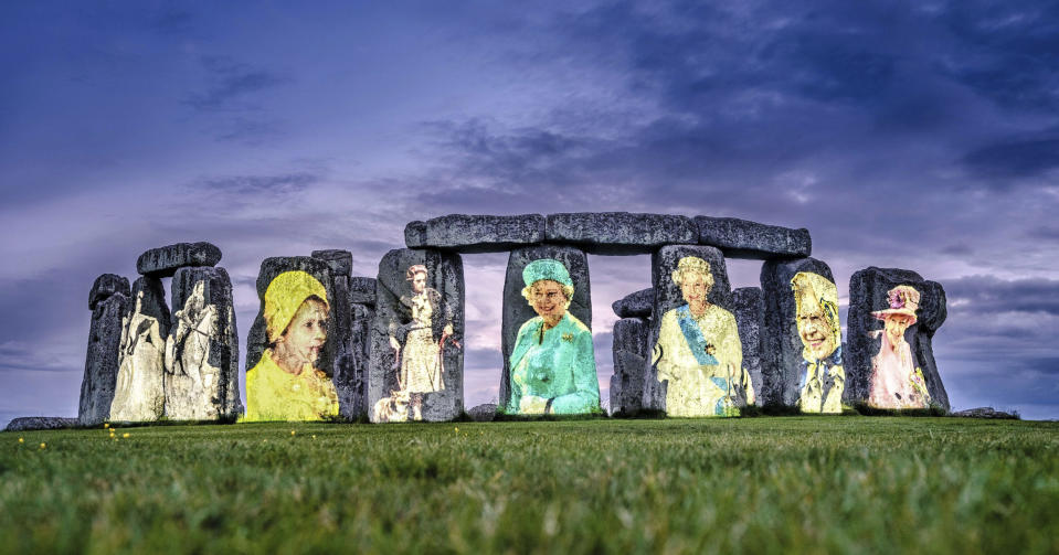 Images of the queen in each decade of her reign were projected onto Stonehenge this week to mark the Platinum Jubilee.  (Jim Holden / English Heritage via AP)