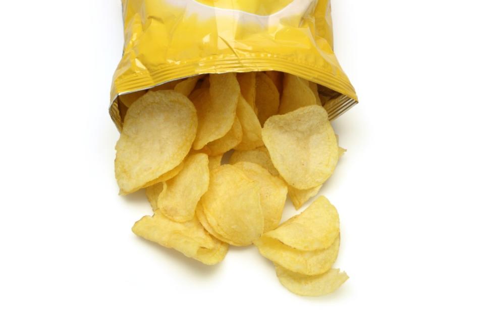 A typical single-serving bag of fried chips has 149 calories, 10 grams of total fat and 1 gram of saturated fat. Getty Images