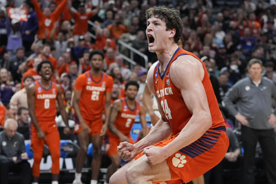 Clemson center PJ Hall celebrates after a dunk during the second half of an Elite 8 college basketball game against Alabama in the NCAA tournament Saturday, March 30, 2024, in Los Angeles. (AP Photo/Ryan Sun)