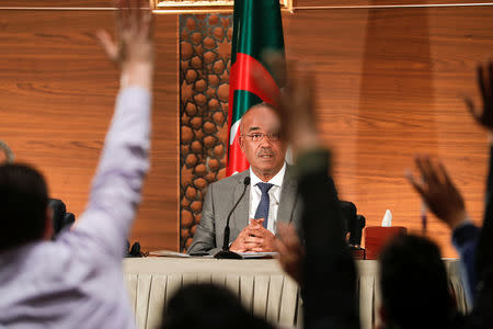 Algeria's newly appointed prime minister, Noureddine Bedoui, holds a joint news conference with deputy prime minister Ramtane Lamamra, in Algiers, Algeria March 14, 2019. REUTERS/Zohra Bensemra