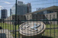 <p>A dove and olive branch symbol is displayed behind a fence at the U.S. Embassy following an explosion in Beijing, China, on Thursday, July 26, 2018. (Photo: Gilles Sabrie/Bloomberg via Getty Images) </p>